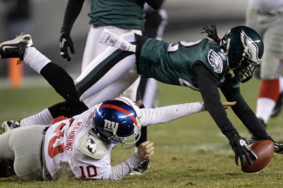 Asante Samuel recovers an Eli Manning fumble in the Eagles-Giants game earlier this season.